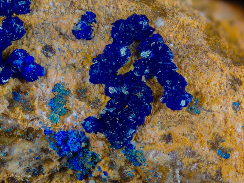 Blue azurite mineral crystal surface at 5x magnification